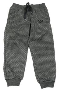 Tmavošedé melírované prošívané/vzorované vyteplené tepláky Adidas