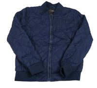 Tmavomodrá prošívaná šusťáková zateplená bunda Charles Vögele