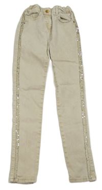 Béžové skinny rifle s třpytivými pruhy 