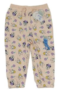 Nové - světlebroskvové tepláky s Minnie a Daisy a kytičkami PRIMARK