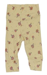 Svetložlté bodkovaná é rebrované tepláky s kvietkami Ergee