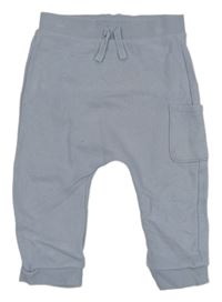 Modré tepláky s vreckom Tu