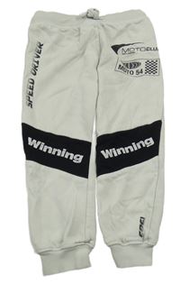 Svetlošedá -čierne tepláky s nápismi H&M