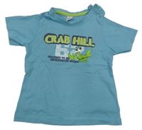 Modré tričko s rakem a nápisem Dopodopo