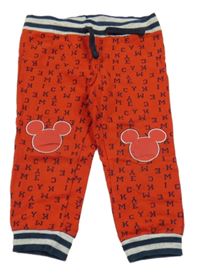 Červené tepláky s písmeny a Mickeym Disney
