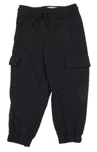 Čierne šušťákové cuff nohavice s vreckami Primark