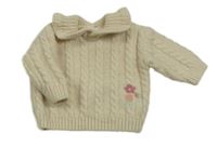 Světlebéžový svetr s kytičkou Nutmeg