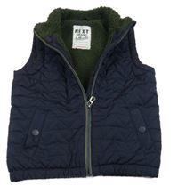 Tmavomodrá prošívaná šusťáková zateplená vesta Next