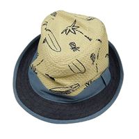 Béžovo-modrý klobúk s obrázkami Pusblu
