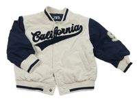 Bílo-tmavomodrá šusťáková zateplená jarní bunda s nápisem Zara