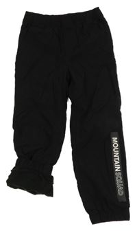 Černé šusťákové podšité cuff kalhoty s nápisem Bossini