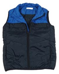 Tmavomodrá šušťáková zateplená vesta Name it