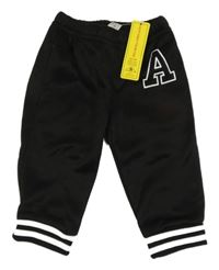 Nové - Čierne tepláky s písmenem Shein