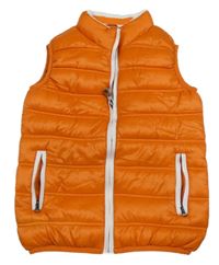 Oranžová prešívaná šušťáková zateplená vesta OVS