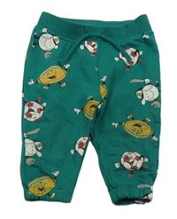 Tmavozelené tepláky s loptami Primark