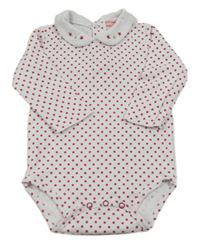 Biele bodkovaná é body s golierikom