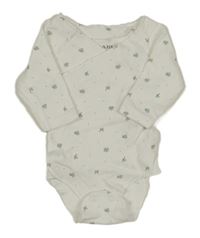 Bílé body s jetelem zn Kiabi