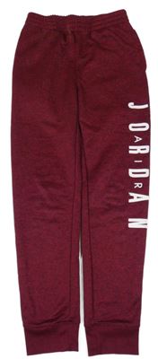 Červeno-čierne melírované športové tepláky s nápisom Air Jordan