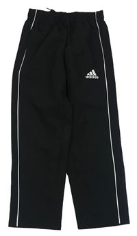 Černé šusťákové kalhoty s proužky Adidas 