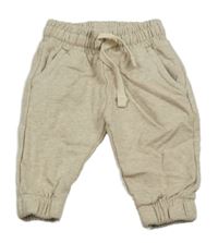 Béžové melírované tepláky Hema