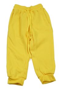 Tmavožlté teplákové tepláky