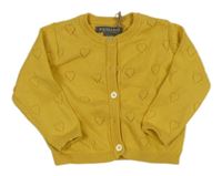 Okrový prepínaci sveter s perforovanými srdiečkami PRIMARK