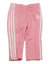 Růžové sportovní tepláky s logem Adidas