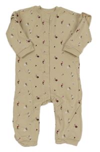 Béžový květovaný teplákový overal s volánky