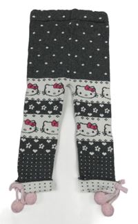 Šedo-bílé vzorované pletené legíny s Hello Kitty a bambulkami 