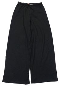 Čierne mačkané široké nohavice H&M