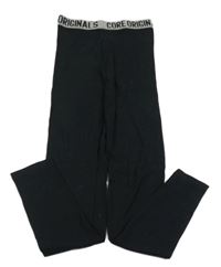 Čierne legíny s nápisem v pase