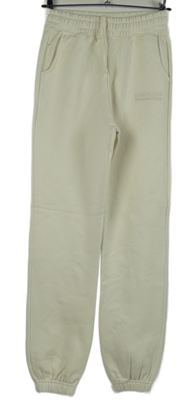 Dámske smotanové cuff tepláky F&F