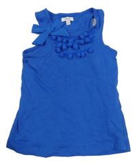 Modrý top s bambulemi a mašlí OVS