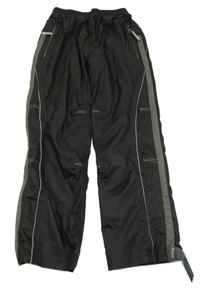 Čierno-tmavosivé šušťákové podšité nohavice s pruhom