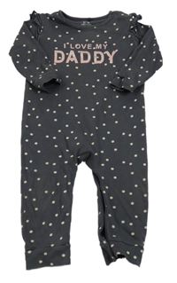 Šedý puntíkatý overal s nápisem Next