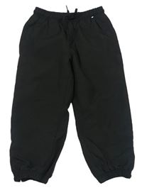 Čierne šušťákové nohavice