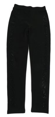 Černé tregíny se vzorem z kamínků 