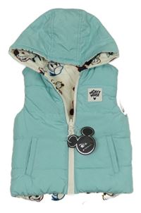 Nové - Tyrkysová oboustranná šusťáková zateplená vesta s Mickeym a kapucí Primark