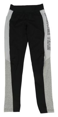 Černo-bílé sportovní legíny s nápisem Erfeenomixx