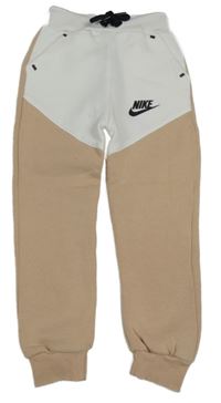 Bílo-béžové cuff tepláky s logem Nike 