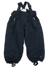 Tmavomodré šusťákové zimní oteplovačky s trakami Topomini