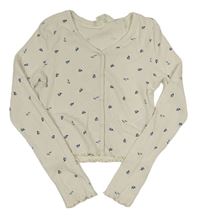 Smotanové kvetované rebrované crop tričko s gombíkmi H&M