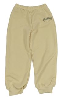 Smotanové tepláky s nápisom Shein