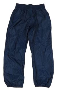 Tmavomodré nepromokavé šušťákové funkčné nohavice Decathlon