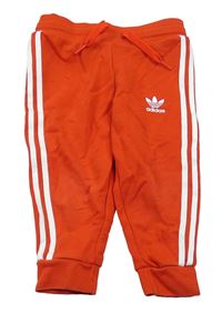 Červené tepláky s logem Adidas