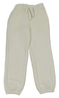 Biele vzorované teplákové nohavice Kids