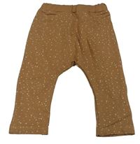 Hnědé puntíkaté baggy tepláky