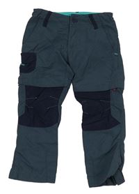 Tmavomodré šusťákové outdoorové kalhoty Quechua