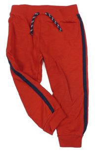 Červené tepláky s pruhem Primark