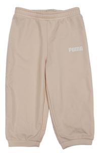 Světlerůžové sportovní kalhoty s logem Puma